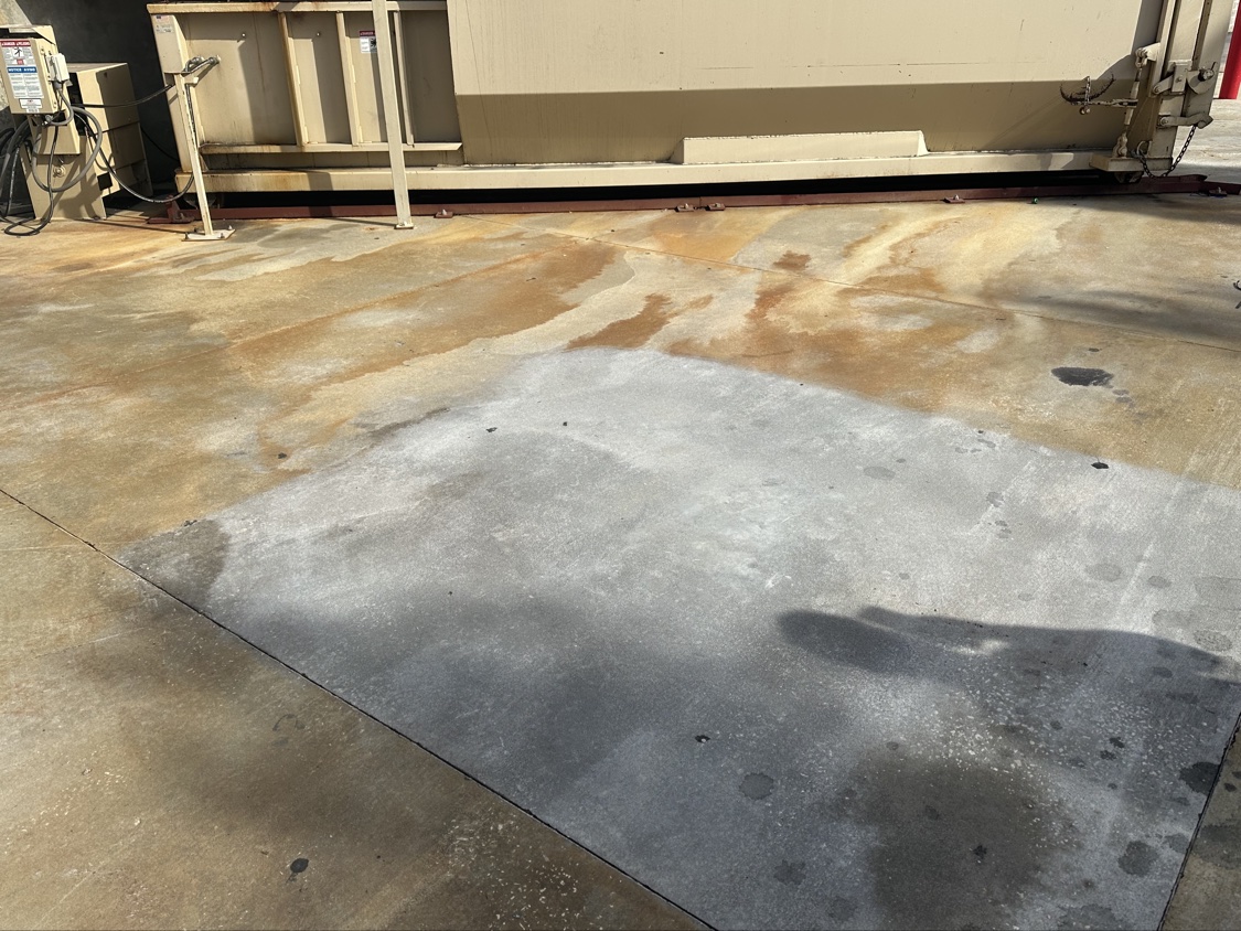 Polished concrete floor with a soft sheen in a small finished room